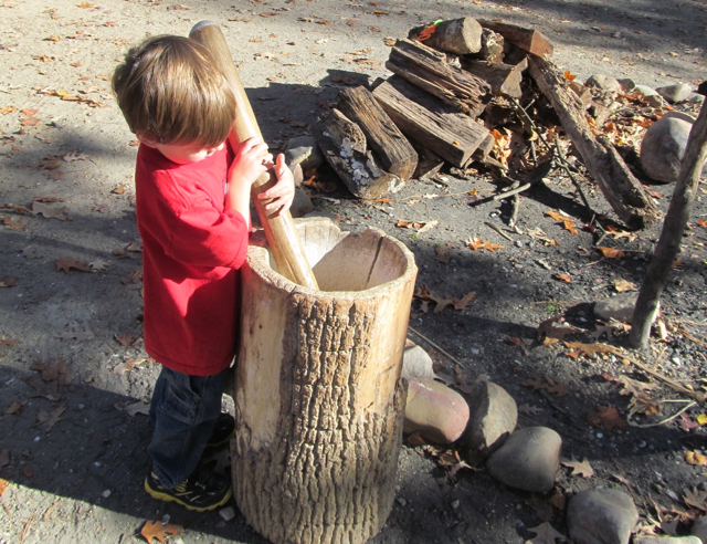 Cameron grinding corn